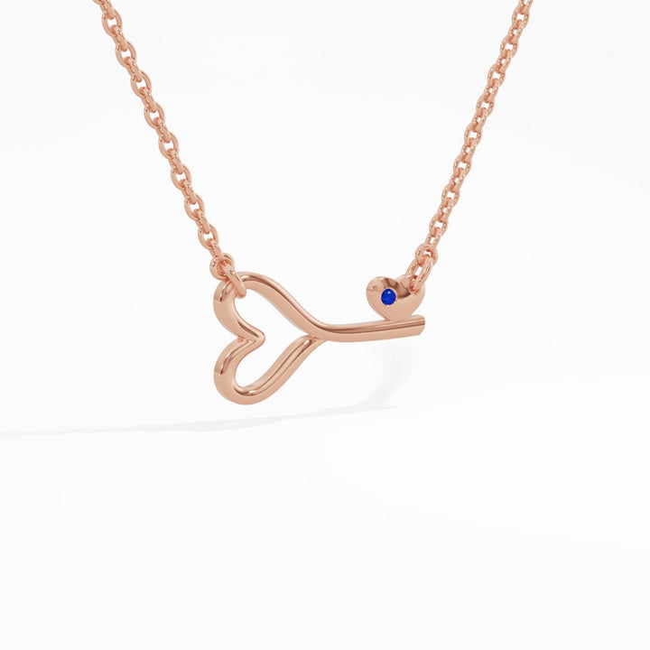 #metal_rose-gold-plated#stone-colour_sapphire-blue